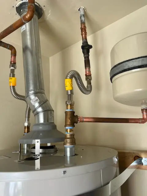Water heater installation and plumbing repair in Garriage Woods